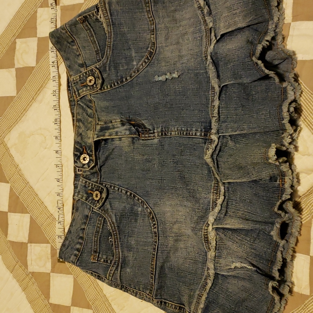 Like new, adorable denim skirt. Cute details on back pocket